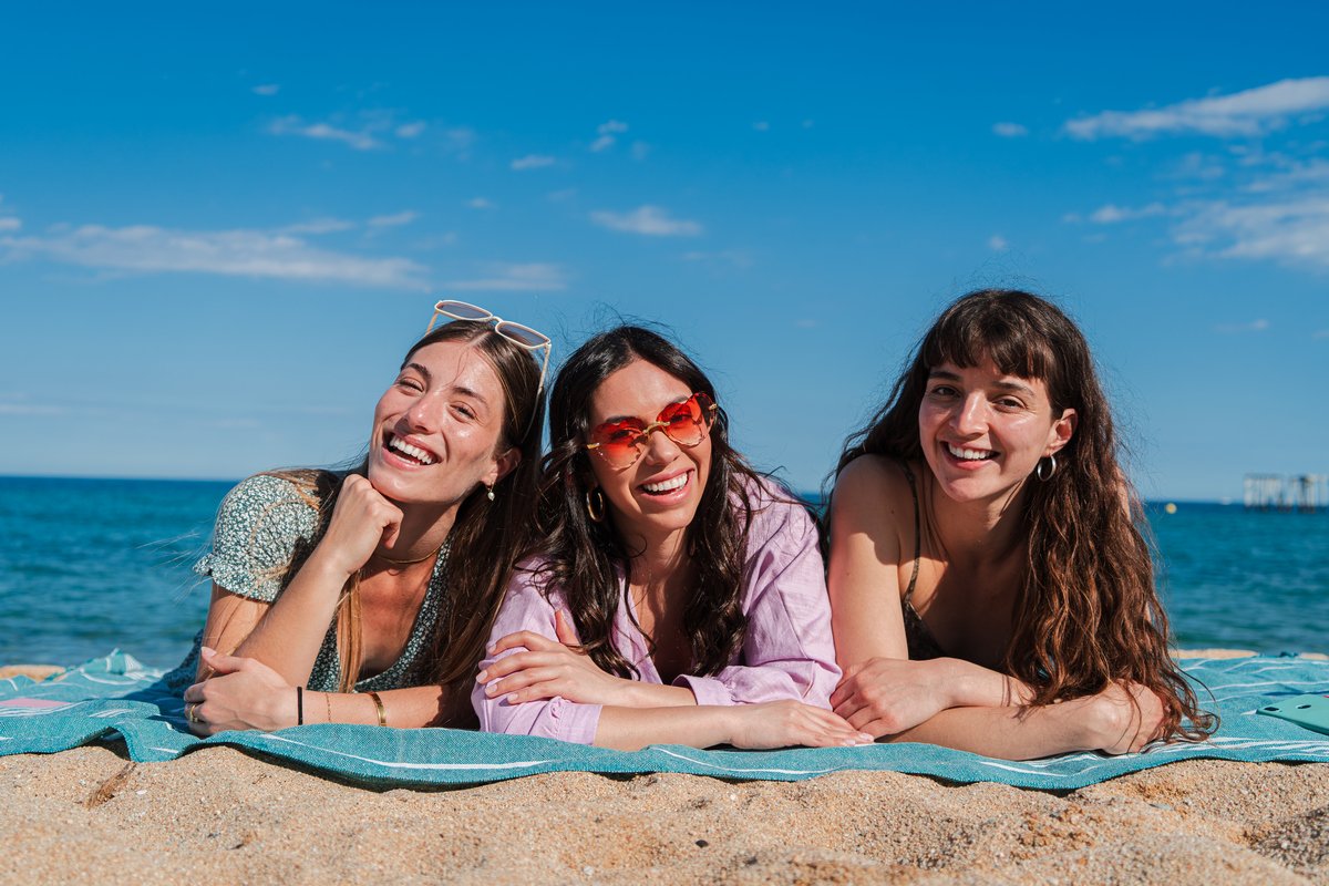 group of only women lying down on the sand of the 2025 02 12 03 15 34 utc